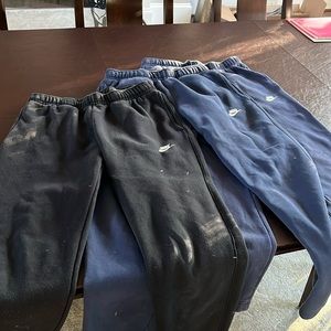 3 pairs of nike men’s sweatpants 2 are both navy and one is black